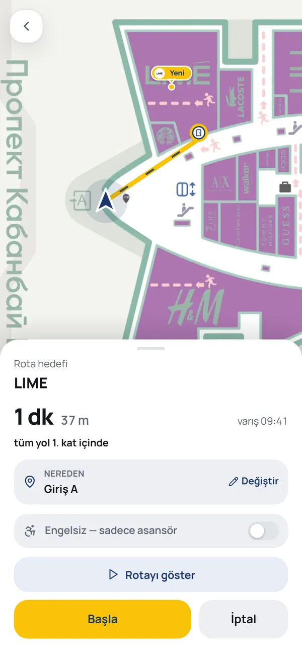 NaviGo rota ekranı: aradığınız kapıya giden sarı çizgi, yürüme süresi ve mesafe